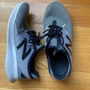 New Balance black and white women’s sneakers